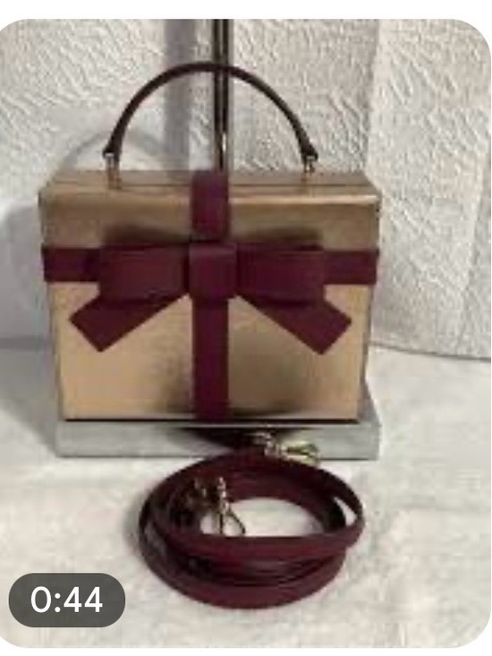 kate spade Handbags - kate spade wrapping Gold Metallic Box Clutch with Burgundy Bow